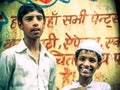 Portrait of smiling Muslim boy.Image taken at Amroha, Uttar Pradesh,India