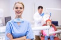 Portrait of smiling nurse with arms crossed Royalty Free Stock Photo