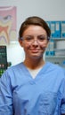 Portrait of smiling nurse in dental office