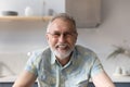 Portrait of smiling older retired man in eyeglasses. Royalty Free Stock Photo