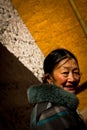 Portrait of a smiling older woman from Tibet