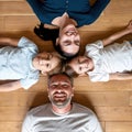 Portrait of smiling parents with small teen children