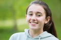 Portrait Of Smiling Pre Teen Girl Outdoors Royalty Free Stock Photo