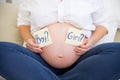 Smiling pregnant woman waiting for a boy or girl Royalty Free Stock Photo