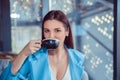 Portrait of smiling pretty woman with cup of coffee Royalty Free Stock Photo