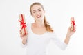 Portrait of a smiling pretty woman holding stack of gift boxes isolated on white background. Holiday concept. Mock up, templa Royalty Free Stock Photo