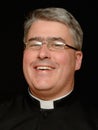 Portrait of smiling priest Royalty Free Stock Photo