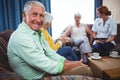 Portrait of a smiling retired man looking at the camera