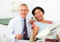 Satisfied patient visiting dentist giving thumbs up Royalty Free Stock Photo