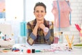 Portrait of smiling seamstress in studio Royalty Free Stock Photo
