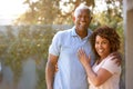 Portrait Of Smiling Senior African American Couple In Garden At Home Royalty Free Stock Photo