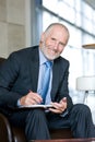 Portrait of smiling Senior business man Royalty Free Stock Photo