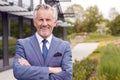 Portrait Of Smiling Senior Businessman CEO Chairman Standing Outside Modern Office Building Royalty Free Stock Photo