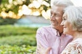 Portrait of smiling senior couple embracing in autumn park Royalty Free Stock Photo