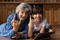 Portrait of smiling mature grandmother have fun with granddaughter Royalty Free Stock Photo