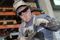 Portrait smiling senior ironworker