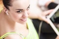 Portrait of Smiling Sensual Woman with Earphones. Shallow Depth