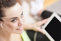 Portrait of Smiling Sensual Woman with Earphones. Shallow Depth