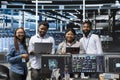 Portrait of smiling server hub engineers using AI algorithms Royalty Free Stock Photo