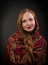 Portrait of smiling slavonic girl with red braided hair Royalty Free Stock Photo