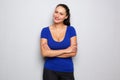 Smiling sporty woman standing with arms crossed Royalty Free Stock Photo