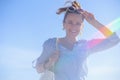 Portrait of smiling stylish woman at beach having fun time Royalty Free Stock Photo