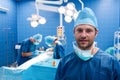 Portrait of smiling surgeon in operation room Royalty Free Stock Photo