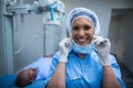 Portrait of smiling surgeon in operation room Royalty Free Stock Photo