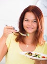 teenager eating salad Royalty Free Stock Photo