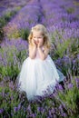 Portrait smiling toddler girl in lavender Royalty Free Stock Photo