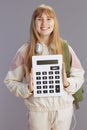 Portrait of smiling trendy girl in beige tracksuit Royalty Free Stock Photo