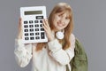 Portrait of smiling trendy teenager girl in beige tracksuit Royalty Free Stock Photo