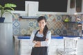 Waitress standing with arms crossed in cafe Royalty Free Stock Photo