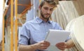 Portrait of a smiling warehouse keeper at work Royalty Free Stock Photo