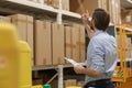 Portrait of a smiling warehouse keeper at work Royalty Free Stock Photo