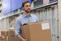 Portrait of a smiling warehouse keeper at work Royalty Free Stock Photo