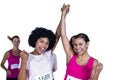 Portrait of smiling winner athletes with arms raised Royalty Free Stock Photo