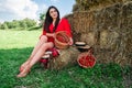 Portrait of Smiling Woman with Basket of Strawberries Royalty Free Stock Photo