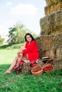 Portrait of Smiling Woman with Basket of Strawberries Royalty Free Stock Photo