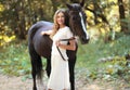 Portrait smiling woman and horse Royalty Free Stock Photo