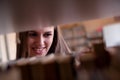 Portrait of smiling woman in library