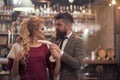 Portrait of smiling woman looking lovingly at stranger man in cafe. Young couple at restaurant. Lovers in cafe, date Royalty Free Stock Photo