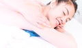 Portrait of smiling woman naked on spa bed Royalty Free Stock Photo
