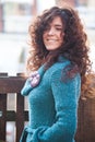 Portrait of smiling woman with natural curly hair Royalty Free Stock Photo