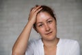 Portrait of a smiling woman with a pigmented spot on her forehead. Girl with Vitiligo Disease.