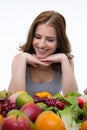 Portrait of a smiling woman sitting at the table Royalty Free Stock Photo