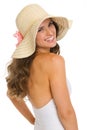 Portrait of smiling woman in swimsuit and hat Royalty Free Stock Photo