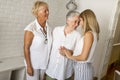 Portrait of a smiling woman , grandmother and granddaughter Royalty Free Stock Photo