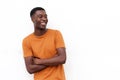 Smiling young african american man with arms crossed and t shirt against isolated white background Royalty Free Stock Photo