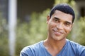 Portrait of smiling young African American man, close up Royalty Free Stock Photo